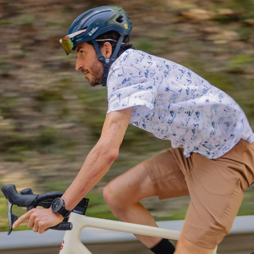 cyclist with our pamera shirt inspired by the sea and gravel cargo pants to carry the cell phone